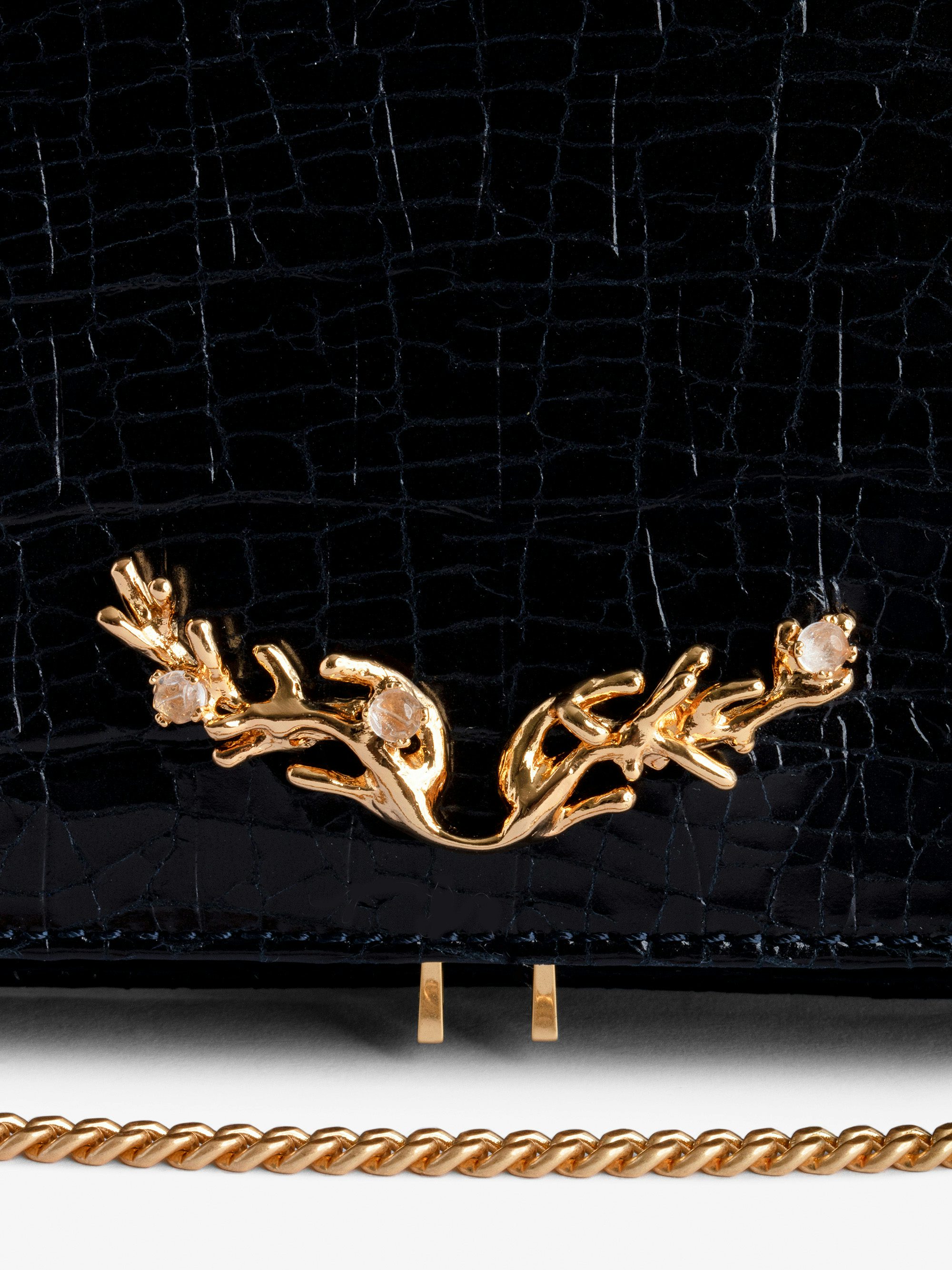 Rock Goossens Embossed Clutch - Zadig&Voltaire called upon the expertise of the art house GOOSSENS to highlight its emblematic wings on its iconic bag: the ROCK clutch.